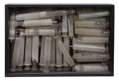 Arman – Accumulation of glass syringes in a wooden box